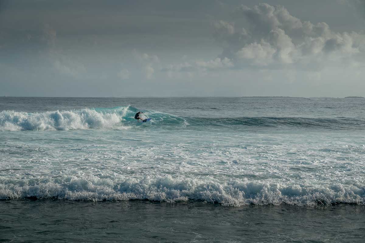 Surfer at Cinnamon Dhonvelli Maldives