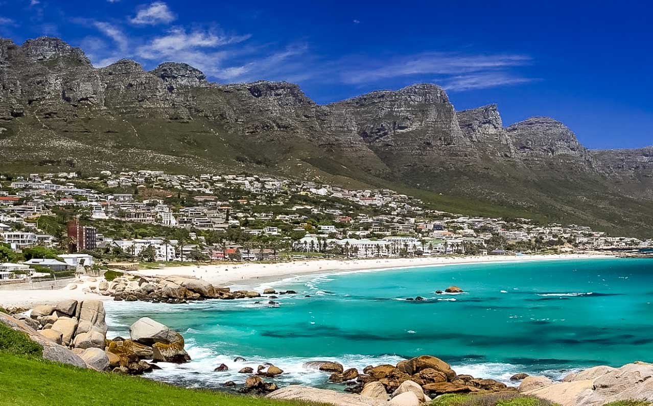 The azure waters of Camps Bay beach, Capetown South Africa