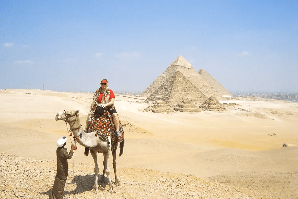 Me atop a camel at the Pyramids of Giza