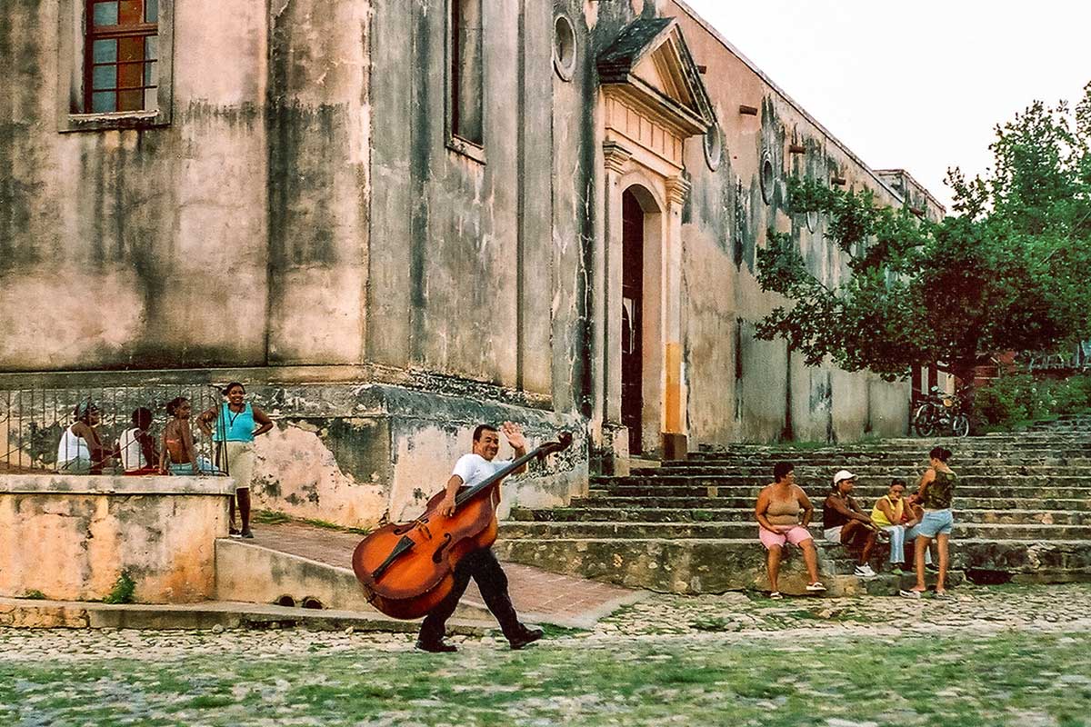 Musician on his way to work in Trinidad Cuba