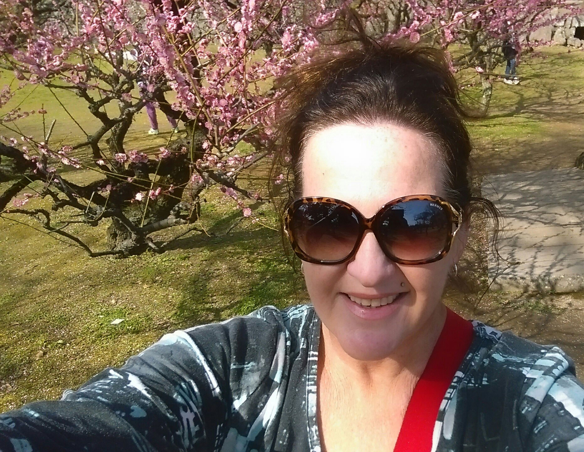 Jen at Kumamoto Castle with the first of the plum blossoms