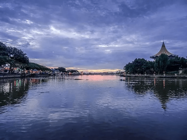 Kuching, Sarawak, Malaysia on the river in the early evening.