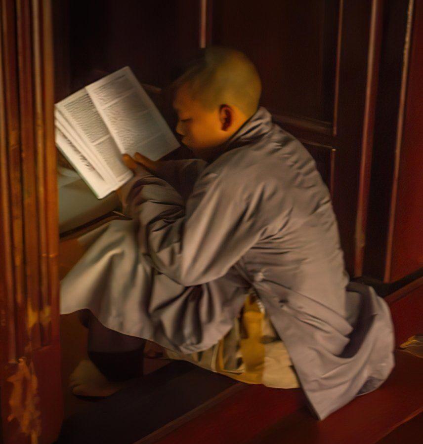 Young monk learning in Hue